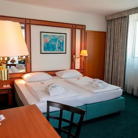 Отель Amadeus Frankfurt 4*